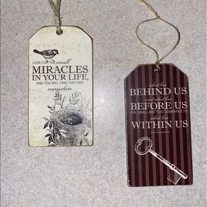 2 small wooden hanging signs